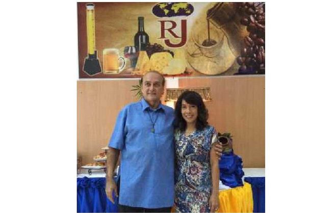 Richard and Jenny Poirier, the husband-and-wife founders of RJ Agency, standing together in their Cebu office